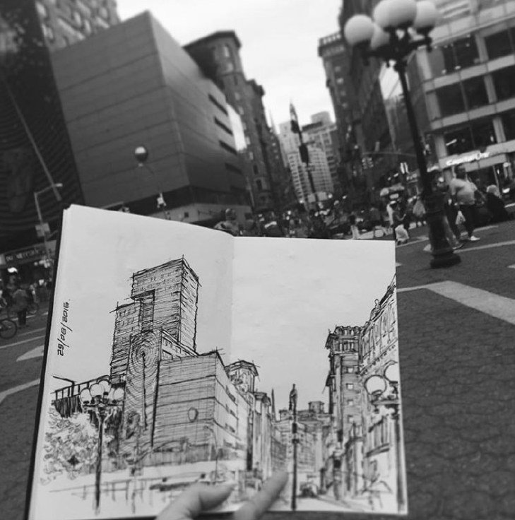 Ink sketch of Union Square buildings held up against the real street
